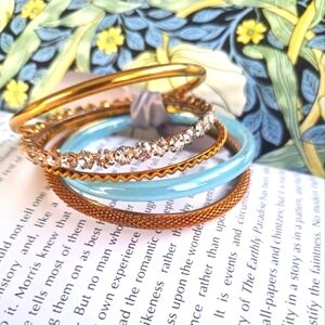 Set of 5 gold and blue tone bracelets